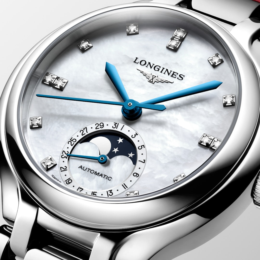 Longines PrimaLuna Moonphase White Mother of Pearl with Diamonds and Red Strap 34mm L81264872 dial closeup