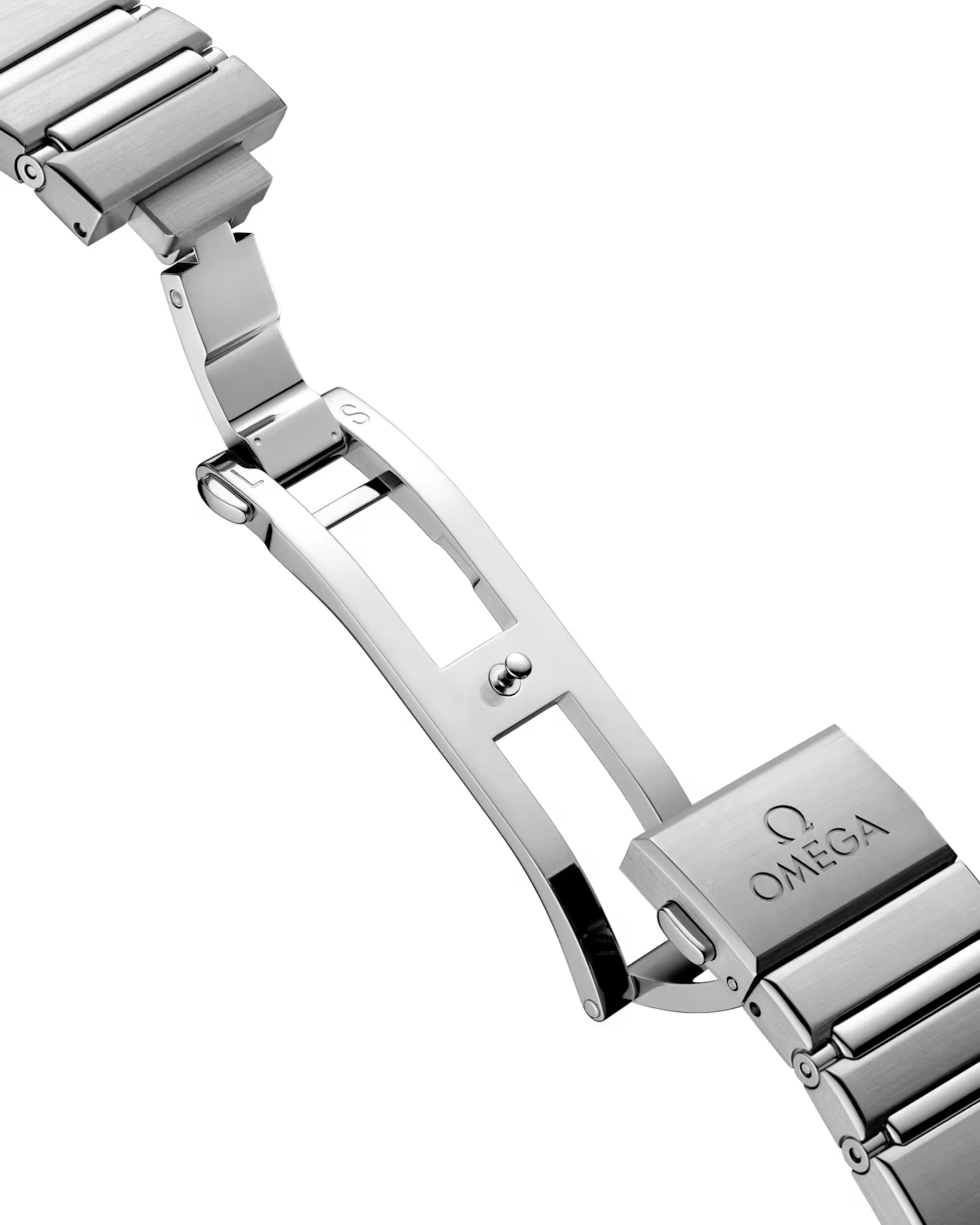 Angled view of an open Omega watch clasp.